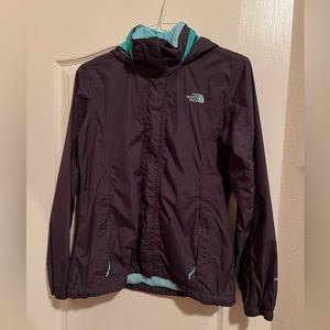 The Northface women’s medium Hyvent lightweight hooded jacket with mesh lining.